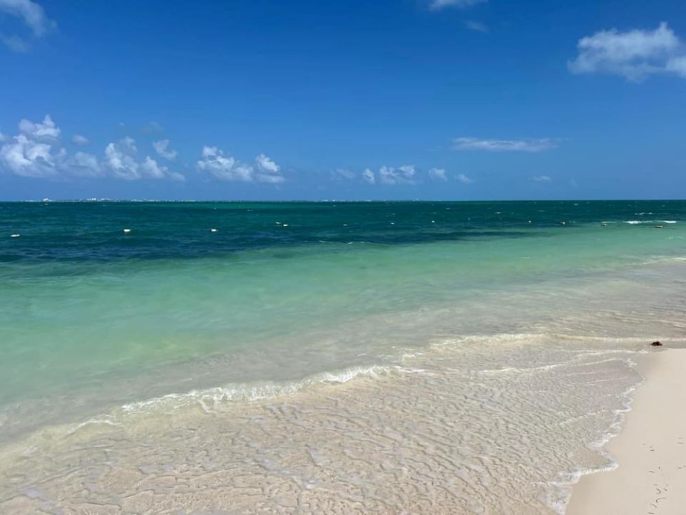 Wide sandy beach at ATELIER Playa Mujeres in Mexico